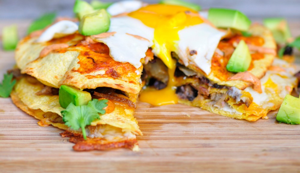 Vegetarian Enchiladas topped with a fried egg
